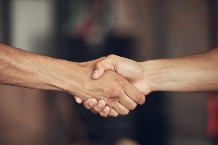 Two hands shaking in agreement