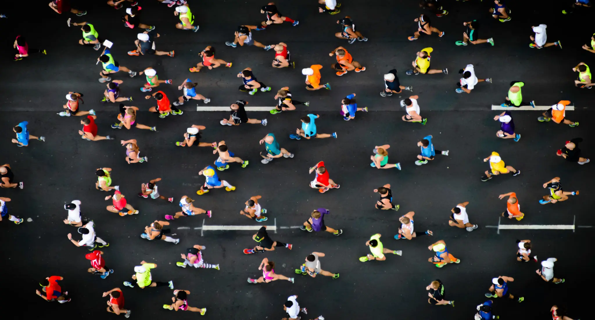 Aerial view of crowded road marathon runners