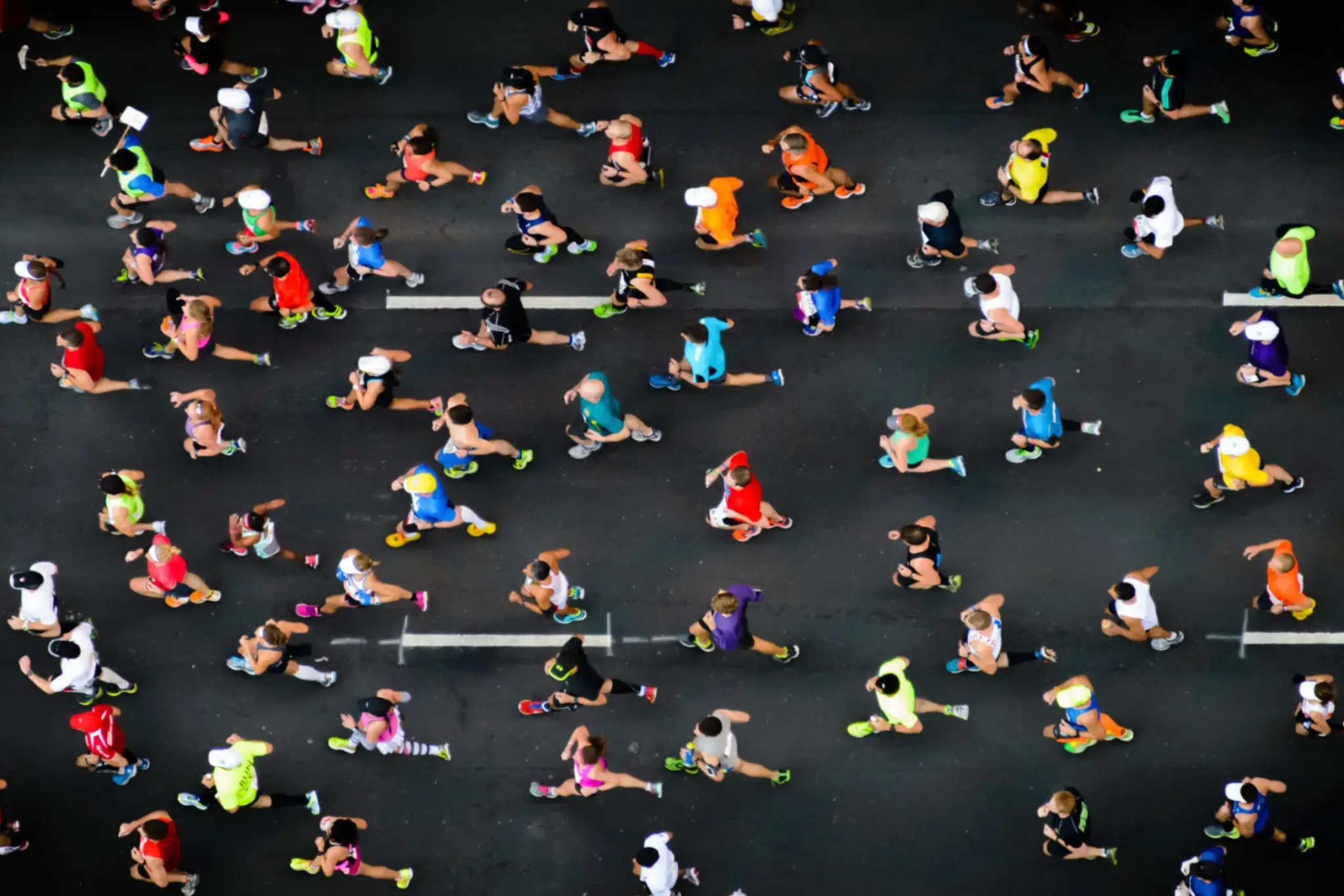 Aerial view of marathon runners on road