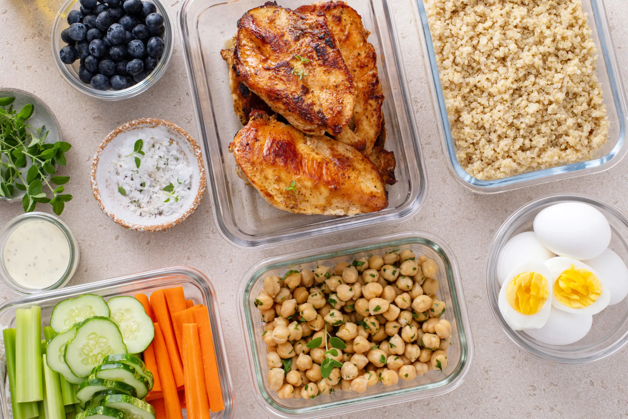 Meal prep containers with grilled chicken and vegetables