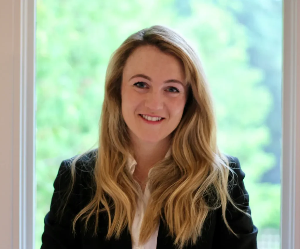 Smiling woman with long blonde hair
