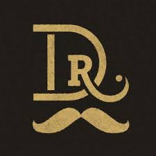 Gold DR monogram logo with mustache