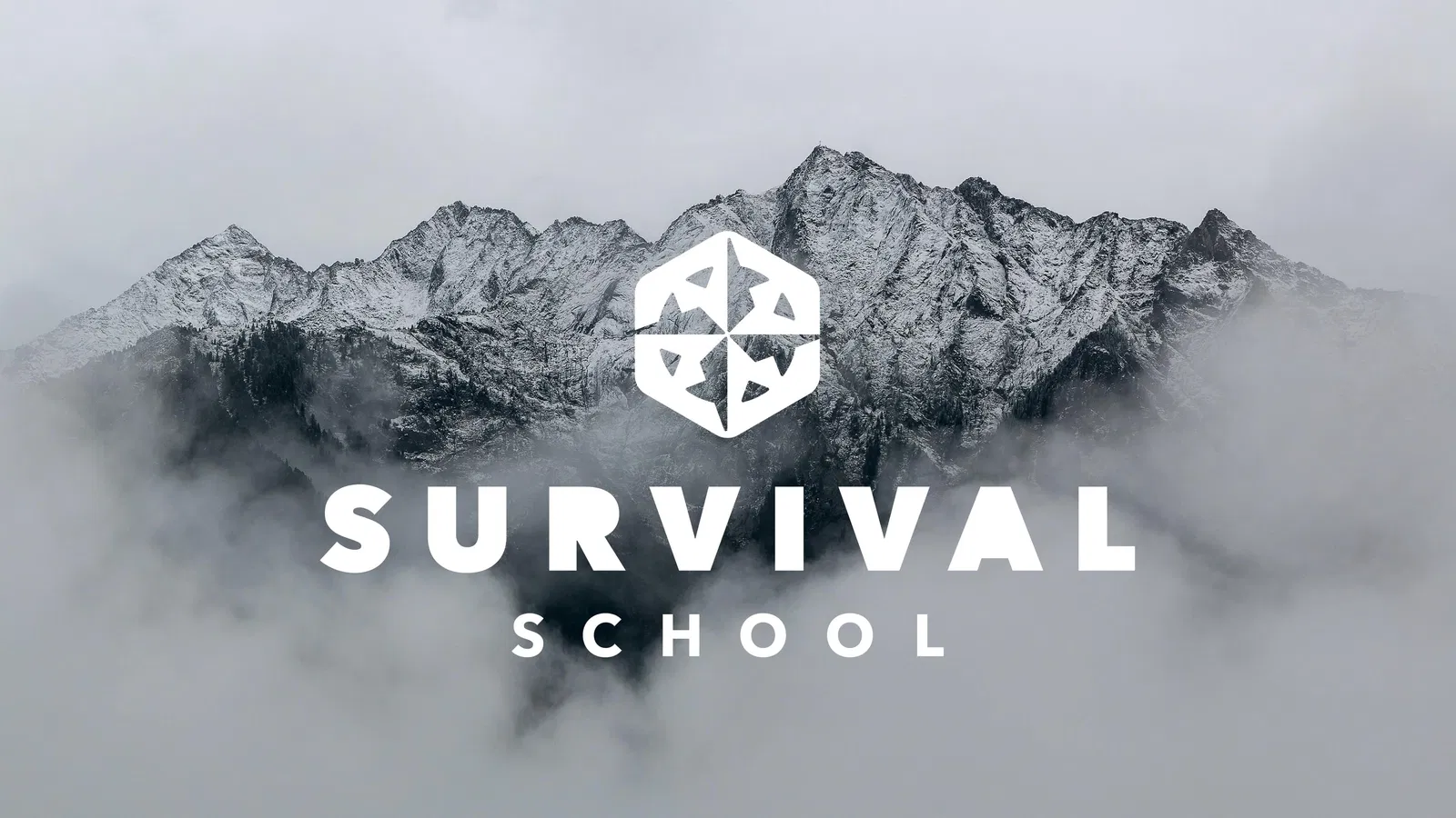 Foggy snow-capped mountains with Survival School logo