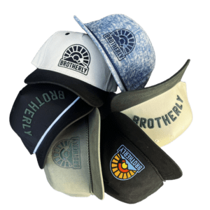 Assorted Brotherly branded caps arranged in circle