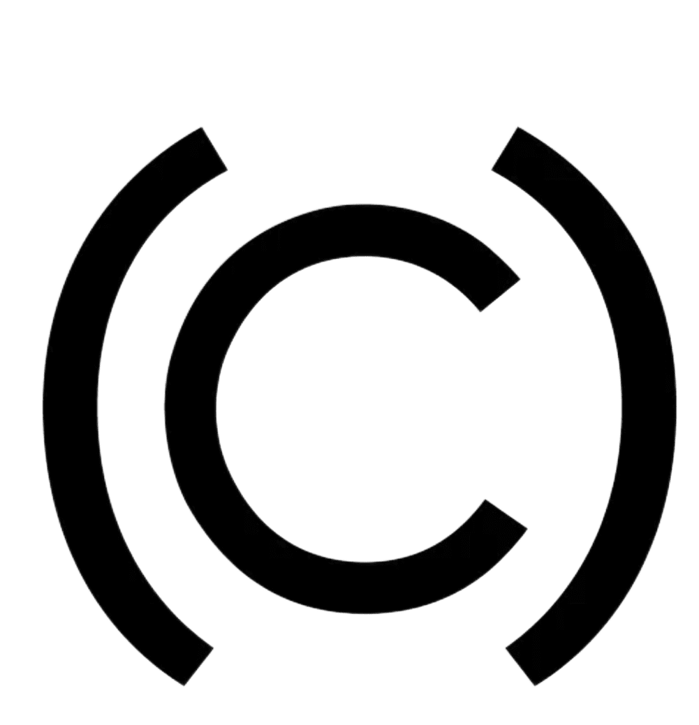 Faint circular copyright symbol on black